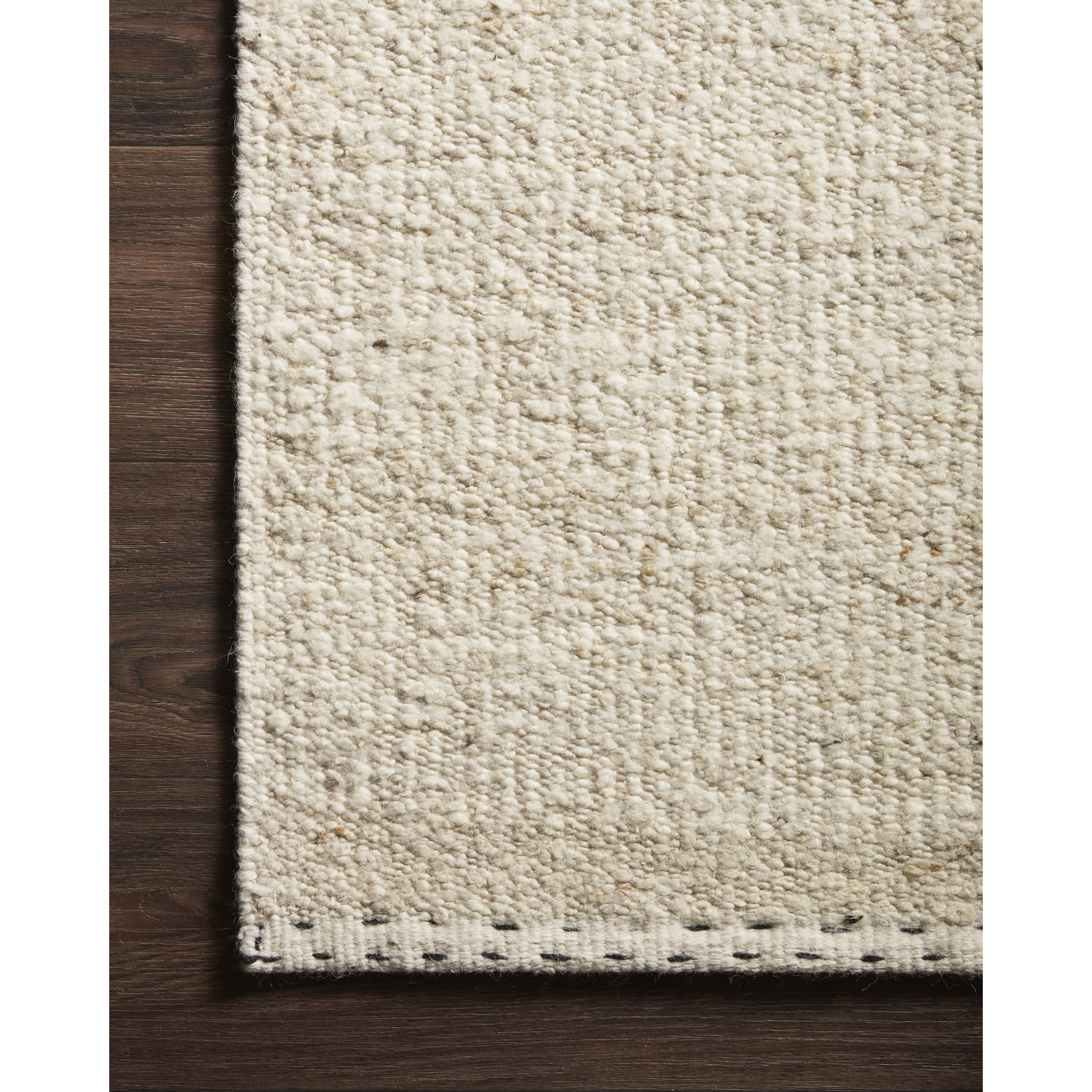 Featuring Sloane Oatmeal Rug by Loloi at Amethyst Home. A perfect blend of refined and relaxed, the Sloane Collection is hand-woven of wool, cotton and polyester by artisans in India. Sloane offers a sophisticated foundation for a contemporarily bohemian look with perfectly woven stripes and minimalist appeal.
Hand Woven79% Wool | 11% Cotton | 7% Polye.  Amethyst Home provides interior design, new home construction design consulting, vintage area rugs, and lighting in the Winter Garden metro area.
