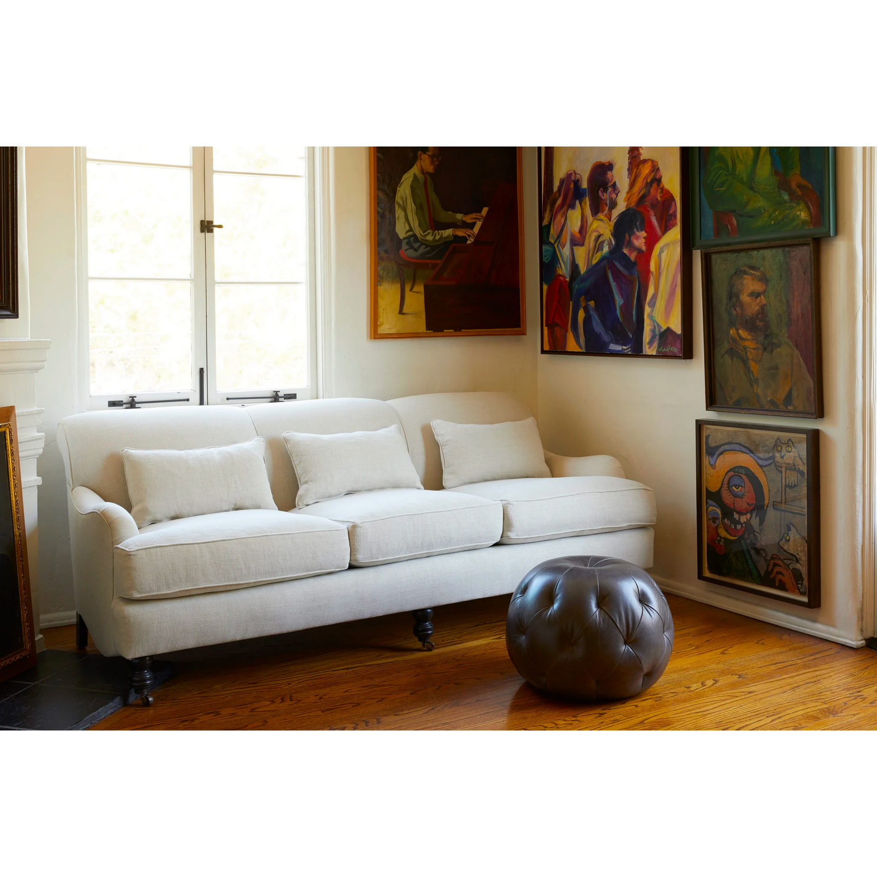 Featuring Beaumont 84" Sofa by Cisco Brothers at Amethyst Home. The Beaumont Sofa by Cisco Brothers is a twist on traditional style, with a piping detail and turned front legs with antique casters. Relax into the comfortable lumber pillows for back support with style. Photographed in Brevard Birch.
Overall: 84"w x 38"d x 33"hSitting Space: 74"w x 24"dSe. Amethyst Home provides interior design, new home construction design consulting, vintage area rugs, and lighting in the Kansas City metro area.