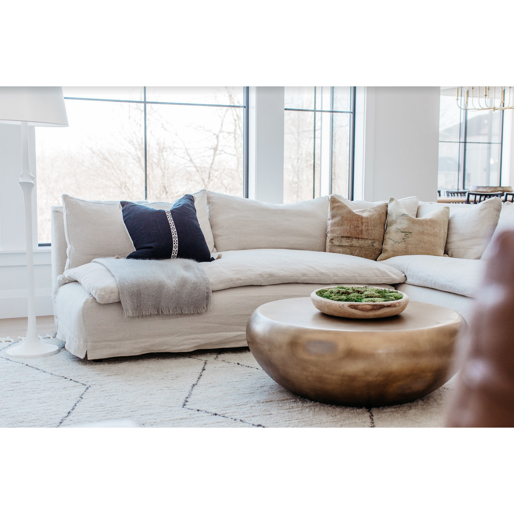 Featuring Laguna 2 Piece Sectional by Cisco Brothers at Amethyst Home. A casual, slipcovered chunky linen sectional by Cisco Brothers, the Laguna 2pc Sectional is the ultimate in casual luxury. A down-filled seat cushion is supported by springs in a gentle, resting position. Pair with a one-of-a-kind statement rug for a signature look. Shown in Otis Whit. Amethyst Home provides interior design, new home construction design consulting, vintage area rugs, and lighting in the Scottsdale metro area.