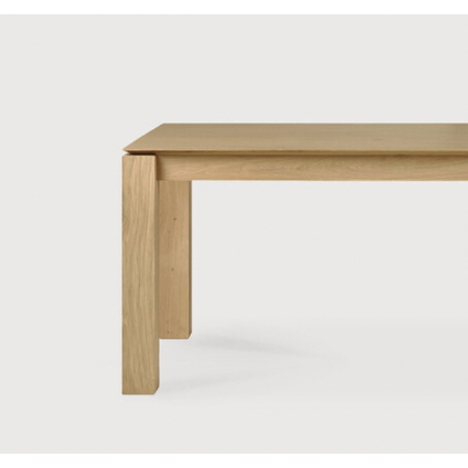 Featuring Oak Slice Dining Table by Ethnicraft at Amethyst Home. A seemingly simple and straightforward piece, the Oak Slice Dining Table features subtle corner details that add playful sophistication to the functional piece. A piece to gather your family and friends around for years to come. 
Material: Oak, 100% Solid WoodFinish: Oil
Dimensions 63": 63"w.  Amethyst Home provides interior design, new home construction design consulting, vintage area rugs, and lighting in the Scottsdale metro area.