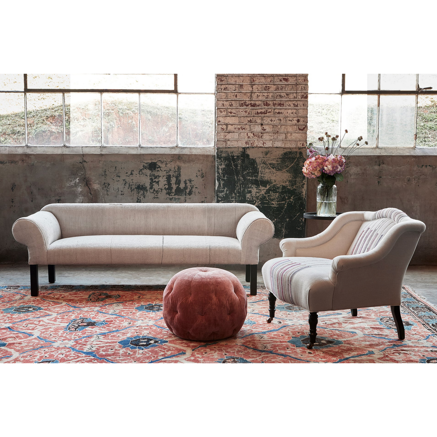 Featuring Pouf 20" Ottoman by Cisco Brothers at Amethyst Home. We love the stitching detail on this Pouf 20" Ottoman by Cisco Brothers. Place in your den, living room, or other entertainment area of your home and keep for years to come! Photographed in Bengal Pin Strip Indigo and Anvil Stone.
Overall: 20"dia x 15"hSeat Height: 15"h. Amethyst Home provides interior design, new home construction design consulting, vintage area rugs, and lighting in the Nashville metro area.