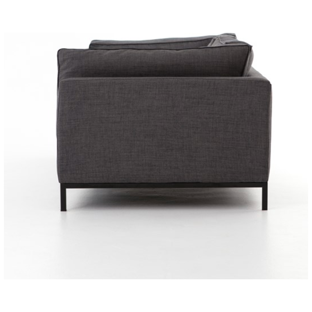 Featuring Grammercy Sofa - Charcoal by Four Hands at Amethyst Home. Streamlined yet comfortable!  We loved the subtle piping of the cushion details and stress-free color!  Flexible style, luxurious comfort and family-friendly upholstery. Clean, simple lines and black iron base keep everything casual and chic. Overall Dimensions: 92"W x 39.50"L x 30"HColors: B.  Amethyst Home provides interior design, new home construction design consulting, vintage area rugs, and lighting in the Austin metro area.