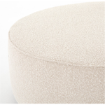 Featuring Sinclair Large Round Ottoman - Knoll Natural by Four Hands at Amethyst Home. This firm round ottoman of textural cream boucle makes a great coffee table or closet bench!
Overall Dimensions: 36"W x 36"L x 14.5"H
Colors: Distressed Natural, Knoll NaturalMaterials: Solid Parawood, 95% Pl, 5% PcFabric: PerformanceWeight: 26.46 lbVolume: 14.02 cu ft.  Amethyst Home provides interior design, new home construction design consulting, vintage area rugs, and lighting in the Washington metro area.