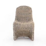 Featuring Portia Dining Chair - Grey Wash by Four Hands at Amethyst Home. Strike a pose. Finished in a washed grey, all-weather wicker seating curves for shapely intrigue, indoors or out. Cover or store inside during inclement weather and when not in use.
Overall Dimensions: 20.50"W x 27"L x 34"HColors: Grey WashMaterials: Banana LeafWeight: 37.7 lbVolume: 12..  Amethyst Home provides interior design, new home construction design consulting, vintage area rugs, and lighting in the Tampa metro area.