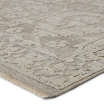Featuring Sonnette Ayres Hand-Knotted Rug by Jaipur Living at Amethyst Home. The richly textured and elegantly designed Sonnette Ayres Area Rug combines an inviting, soft hand and eye-catching transitional style. The Ayres rug boasts a neutral palette of light taupe and gray that creates beautiful dimension among the brocade design. This hand-knotted wool.  Amethyst Home provides interior design, new home construction design consulting, vintage area rugs, and lighting in the Alpharetta metro area.