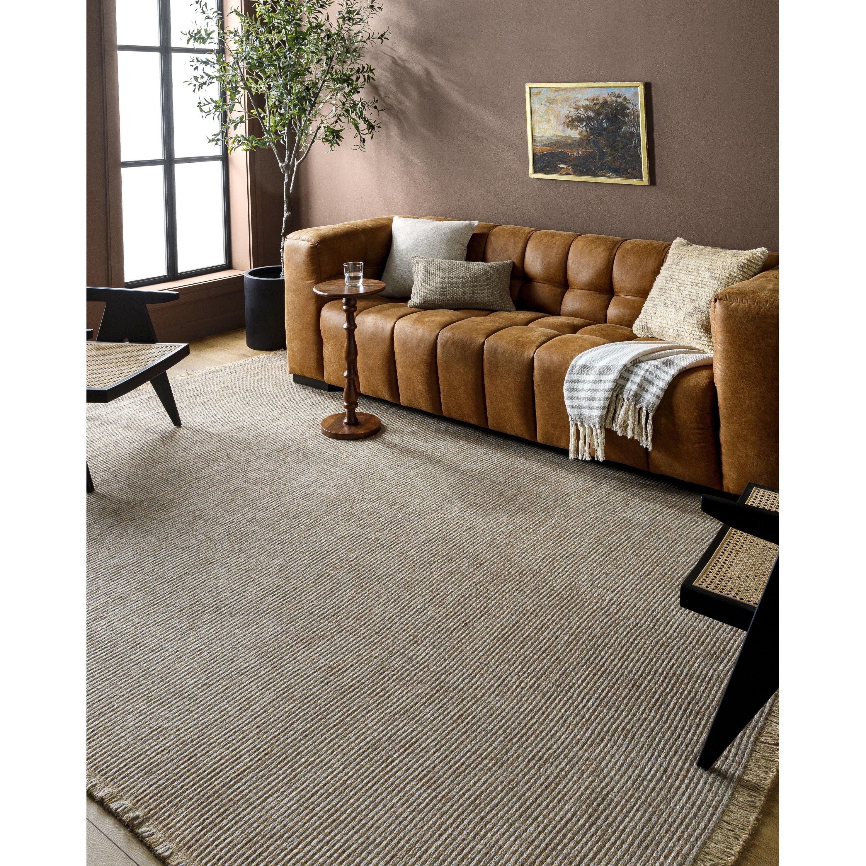 Featuring Becki Owens x Surya Kimi Brown/Gray Rug by Surya at Amethyst Home. This exquisite Kimi area rug from our Becki Owens x Surya line is the perfect combination of style and comfort. Crafted from a unique blend of polypropylene and jute, this rug features a beautiful stitched design that will bring a touch of elegance to any space. The main colors are na. Amethyst Home provides interior design, new home construction design consulting, vintage area rugs, and lighting in the Dallas metro area.