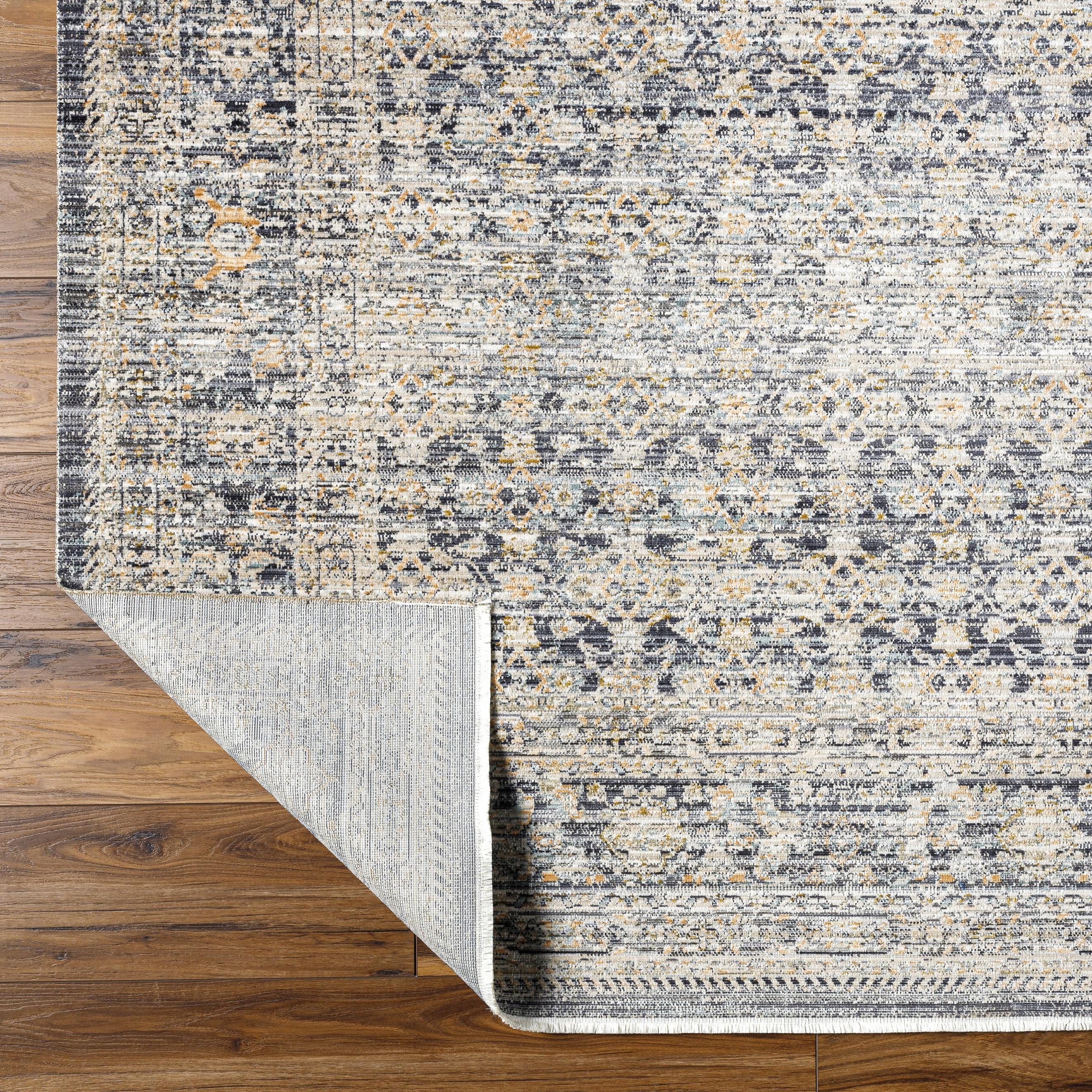 Featuring Becki Owens x Surya Margaret Gray/Charcoal Rug by Surya at Amethyst Home. Introducing the Margaret area rug, the perfect combination of timeless style and modern sophistication! This unique rug from our Becki Owens x Surya collaboration features a distressed vintage design that is sure to bring a cozy, inviting atmosphere to any space. Crafted f. Amethyst Home provides interior design, new home construction design consulting, vintage area rugs, and lighting in the Kansas City metro area.
