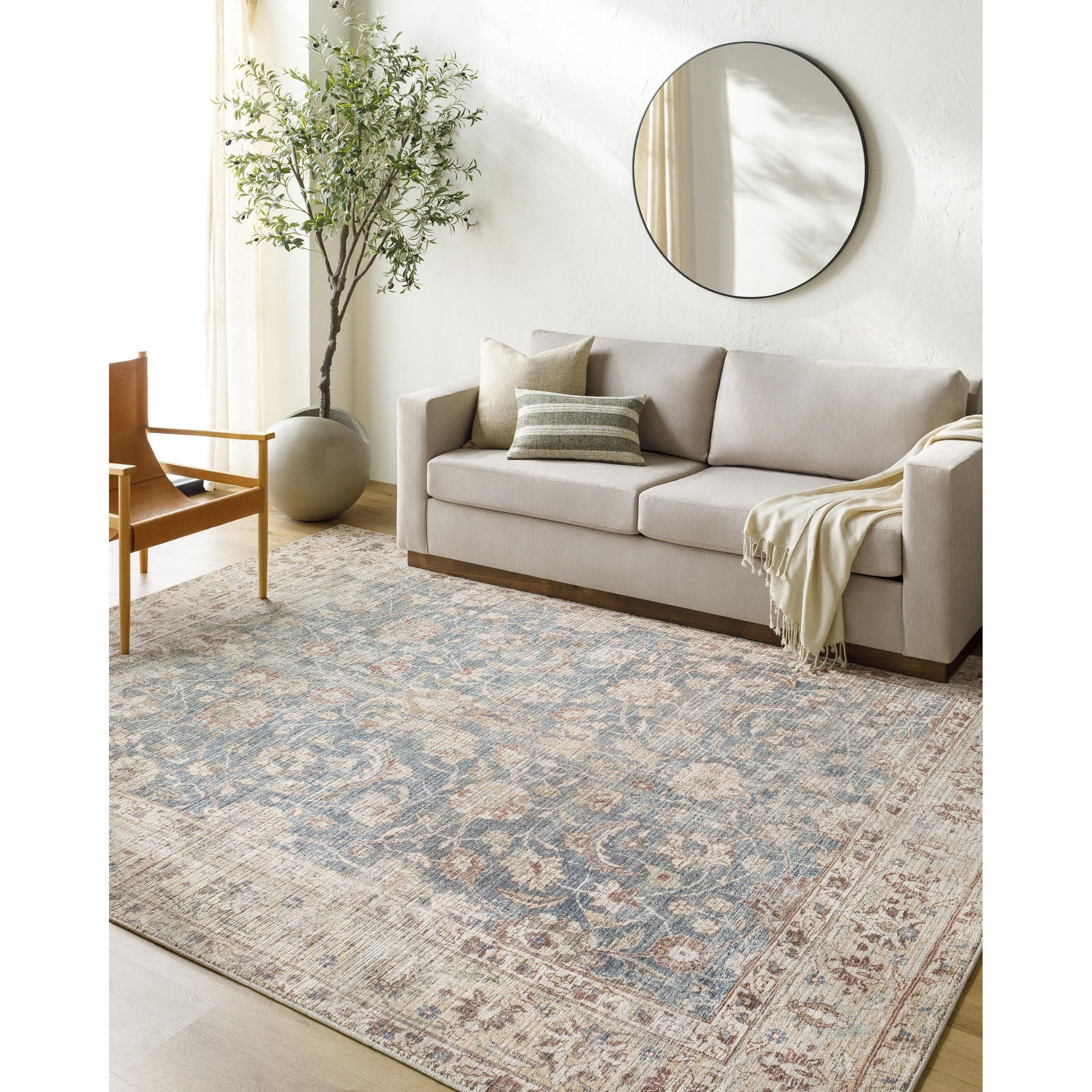 Featuring Becki Owens x Surya Marlene Blue/Tan Rug by Surya at Amethyst Home. This exquisite Marlene area rug is the perfect addition to any space! It is the result of a special collaboration between Surya and Becki Owens, and features an elegant floral pattern in deep blue. The medium pile and high-traffic construction make it ideal for living rooms, bedrooms. Amethyst Home provides interior design, new home construction design consulting, vintage area rugs, and lighting in the Dallas metro area.