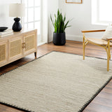 Featuring Berkeley Natural / Charcoal Rug by Surya at Amethyst Home. Pleasantly soft to the touch, this organic flecked wool rug is perfect for a minimalist look.  The unique stitching is our favorite part!  Simply vacuum regularly and clean spills with soap and water.
Hand WovenWoolBKY-2300. Amethyst Home provides interior design, new construction, custom furniture, and rugs for Nashville metro area