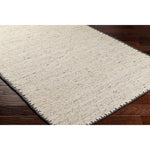 Featuring Berkeley Natural / Charcoal Rug by Surya at Amethyst Home. Pleasantly soft to the touch, this organic flecked wool rug is perfect for a minimalist look.  The unique stitching is our favorite part!  Simply vacuum regularly and clean spills with soap and water.
Hand WovenWoolBKY-2300. Amethyst Home provides interior design, new construction, custom furniture, and rugs for Scottsdale metro area