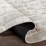 Featuring Eloquent Rug by Surya at Amethyst Home. The simplistic yet compelling rugs from the Eloquent Collection effortlessly serve as the exemplar representation of modern decor. These rugs are hand crafted, radiating an atmosphere that can only be created by a handmade rug. Made with Viscose, Leather in India, and has No Pile. Spot Clean Only, One Year Limited Warranty.
Hand CraftedVi. Amethyst Home provides interior design, new construction, custom furniture, and rugs for Washington metro area