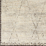Featuring Khyber Natural / Mocha Hand-Knotted Rug by Surya at Amethyst Home. Silky soft to the touch, our favorite nod to a timeless handmade Moroccan look.  Vacuum regularly and pair with your favorite leather chairs.
Hand KnottedWool, PolyesterKHY-2300.  Amethyst Home provides interior design, new home construction design consulting, vintage area rugs, and lighting in the Seattle metro area.