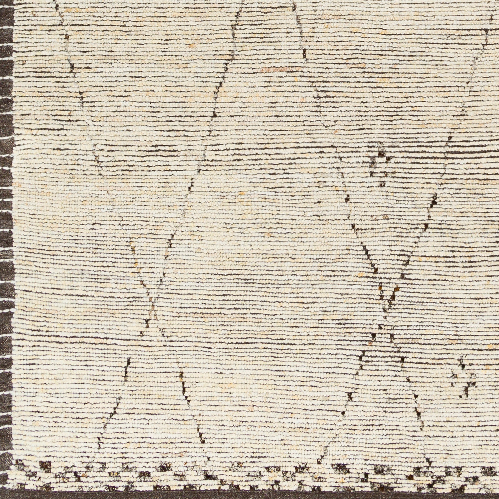 Featuring Khyber Natural / Mocha Hand-Knotted Rug by Surya at Amethyst Home. Silky soft to the touch, our favorite nod to a timeless handmade Moroccan look.  Vacuum regularly and pair with your favorite leather chairs.
Hand KnottedWool, PolyesterKHY-2300.  Amethyst Home provides interior design, new home construction design consulting, vintage area rugs, and lighting in the Seattle metro area.