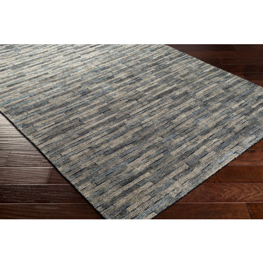 Featuring Malaga Luis Hand-Knotted Rug by Surya at Amethyst Home. The simplistic yet compelling rugs from the Malaga Luis effortlessly serve as the exemplar representation of modern decor. With their Hand-Knotted construction, these rugs provide a durability that can not be found in other handmade constructions, and boasts the ability to be thoroughly cleaned. Amethyst Home provides interior design, new home construction design consulting, vintage area rugs, and lighting in the Houston metro area.