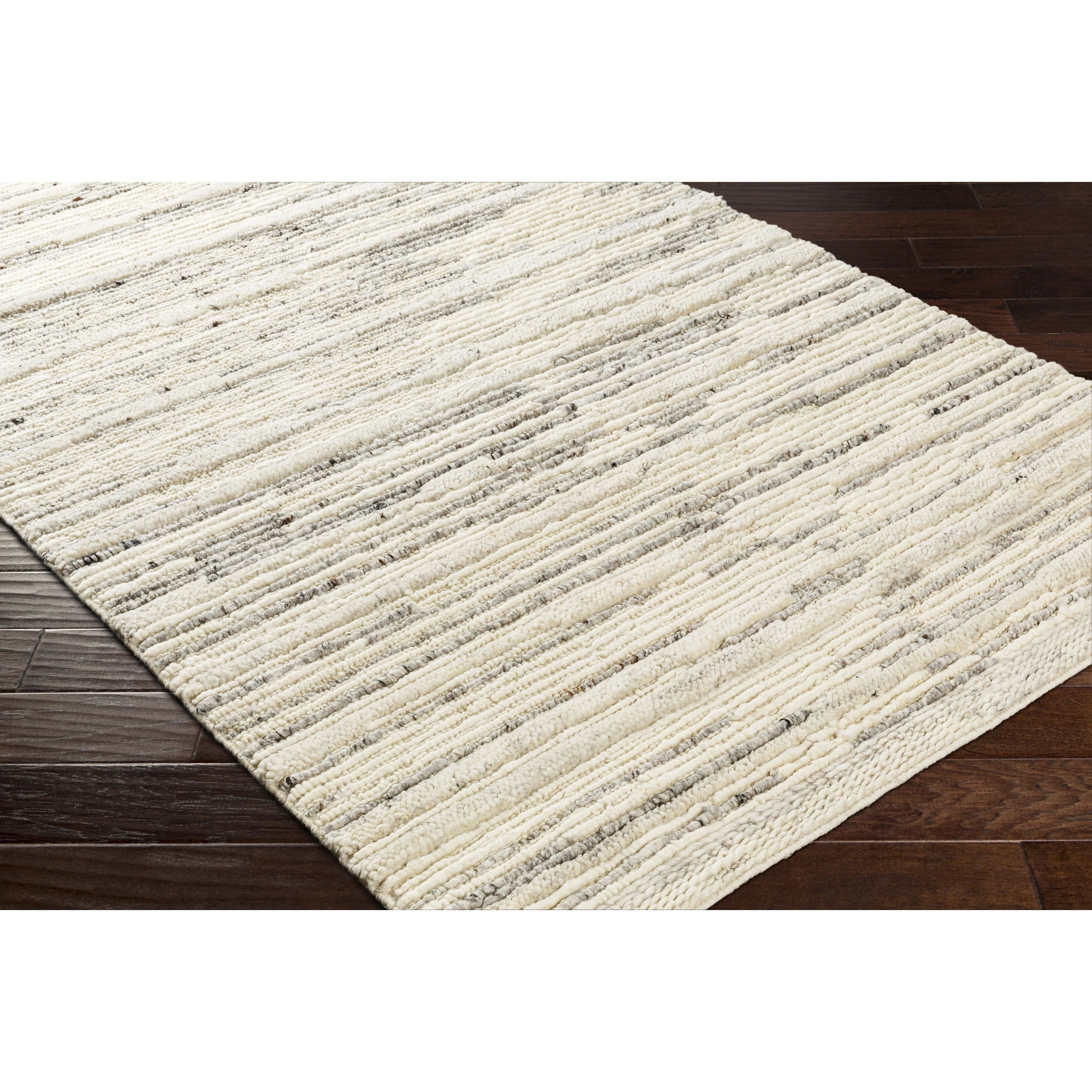 Featuring Manisa Cream & Grey Rug by Surya at Amethyst Home. The Manisa Collection features compelling global inspired designs brimming with elegance and grace! The perfect addition for any home, these pieces will add eclectic charm to any room! The meticulously woven construction of these pieces boasts durability and will provide natural charm into your d. Amethyst Home provides interior design, new home construction design consulting, vintage area rugs, and lighting in the Alpharetta metro area.