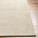 Featuring Mia Rug by Surya at Amethyst Home. The simplistic yet compelling rugs from the Mia Collection effortlessly serve as the exemplar representation of modern decor. The meticulously woven construction of these pieces boasts durability and will provide natural charm into your decor space. Made with Wool in India, and has No Pile. Spot Clean Only, One Year Limited Warranty.
Hand WovenWo. Amethyst Home provides interior design, new construction, custom furniture, and rugs for Houston metro area