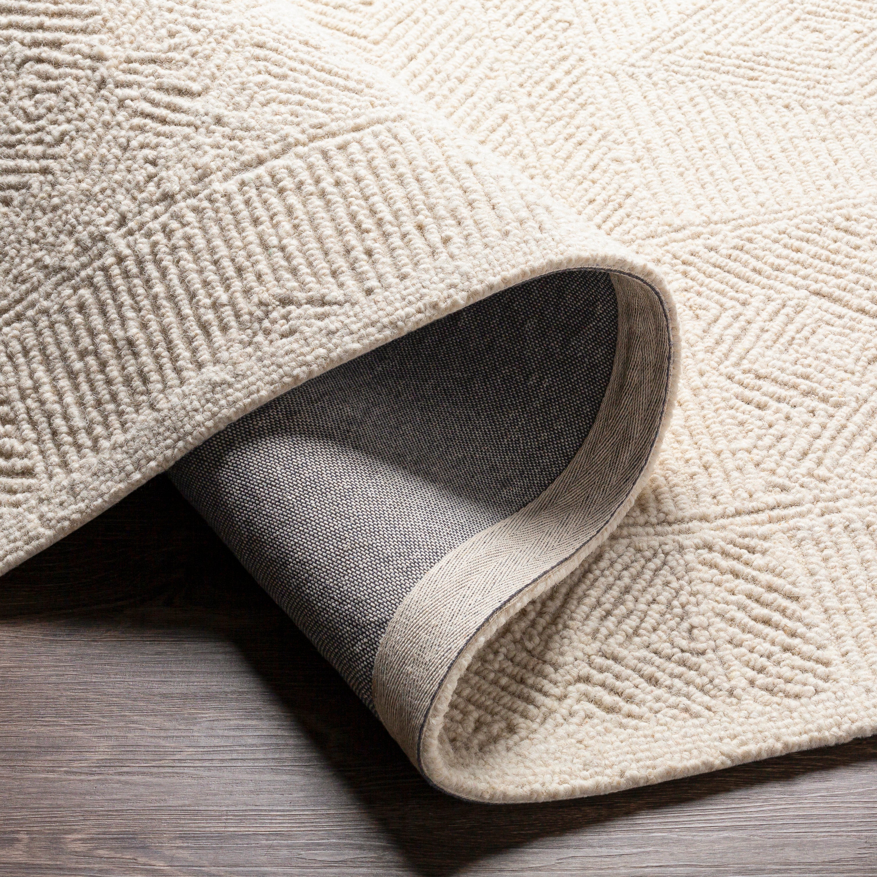 Featuring Newcastle Rug by Surya at Amethyst Home. The Newcastle Collection features compelling global inspired designs brimming with elegance and grace! The perfect addition for any home, these pieces will add eclectic charm to any room! With their hand tufted construction, these rugs offer an affordable alternative to other handmade constructions while pres.  Amethyst Home provides interior design, new home construction design consulting, vintage area rugs, and lighting in the Dallas metro area.