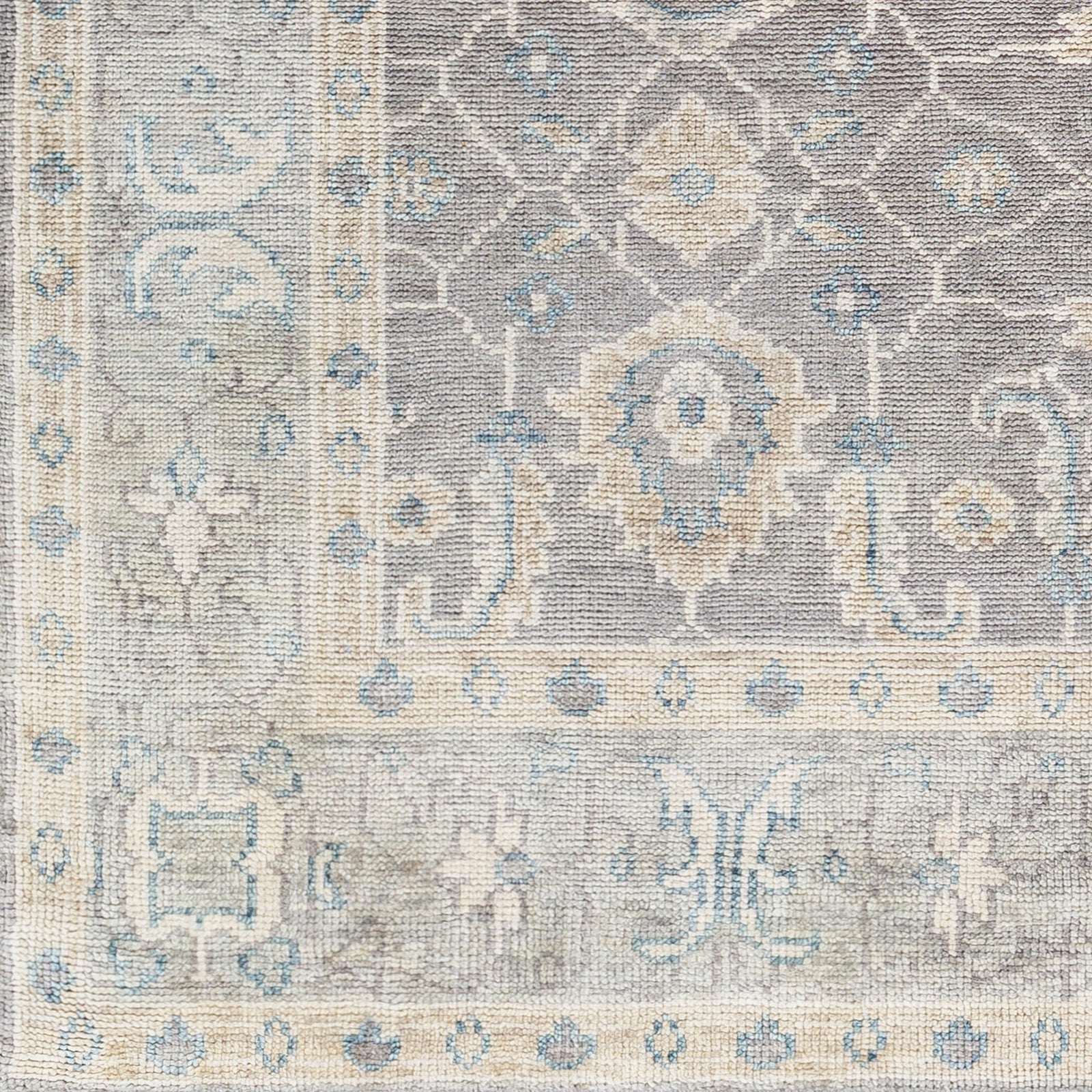 Featuring Palais Hand-Knotted Rug by Surya at Amethyst Home. Give your space an air of sophistication with our Palais Hand-Knotted Rug. Crafted with 100% wool in hues of charcoal, ivory, seafoam, and taupe, the rug features a soft texture and is contrasted with a deep center and bright border for an artful look. Perfect for adding depth and character to any room.
With their Hand-Kn. Amethyst Home provides interior design, new construction, custom furniture, and area rugs in the Hamptons metro area
