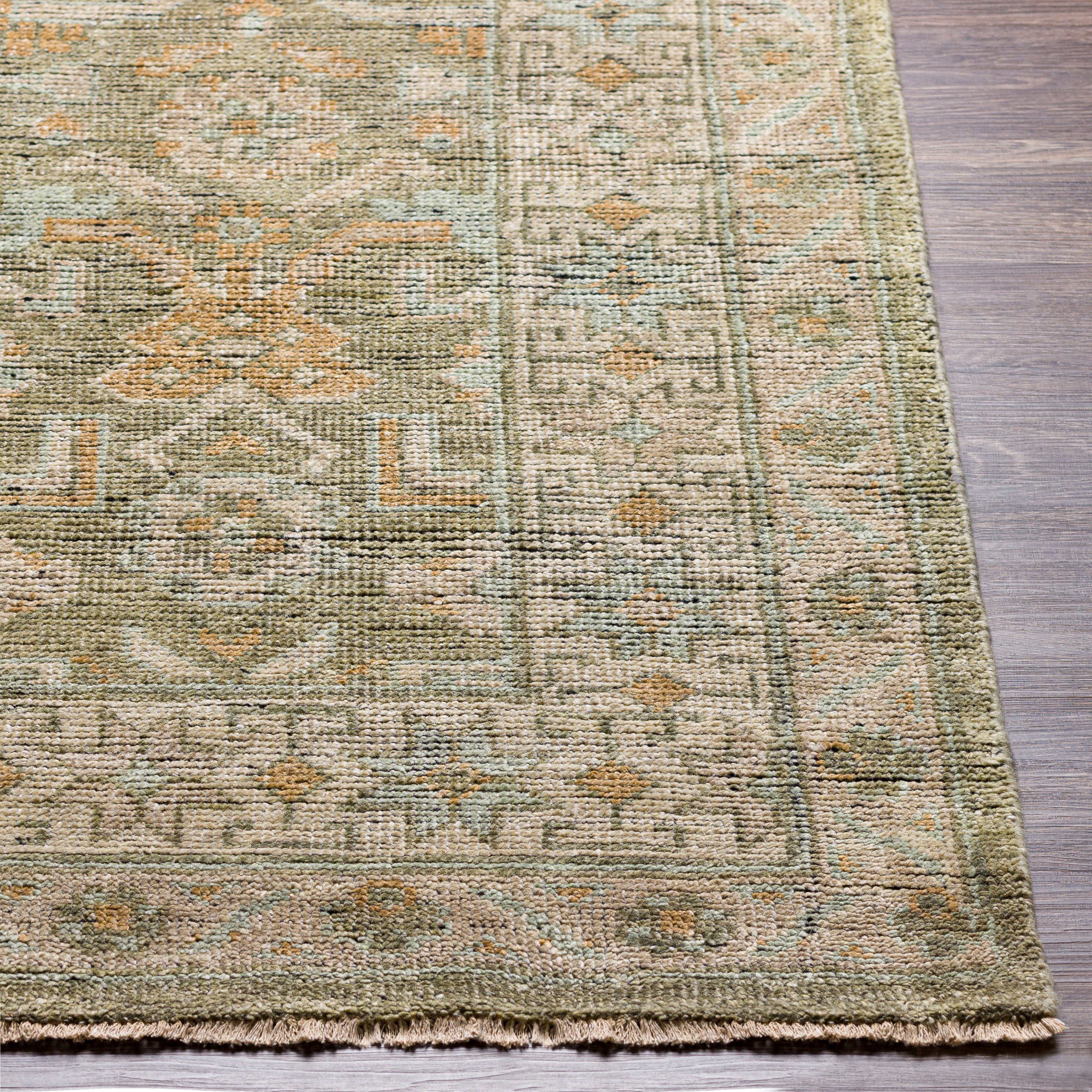 Featuring Reign Hand-Knotted Rug by Surya at Amethyst Home. The Reign Collection showcases traditional inspired designs that exemplify timeless styles of elegance, comfort, and sophistication. With their hand knotted construction, these rugs provide a durability that can not be found in other handmade constructions, and boasts the ability to be thoroughly.  Amethyst Home provides interior design, new home construction design consulting, vintage area rugs, and lighting in the Des Moines metro area.