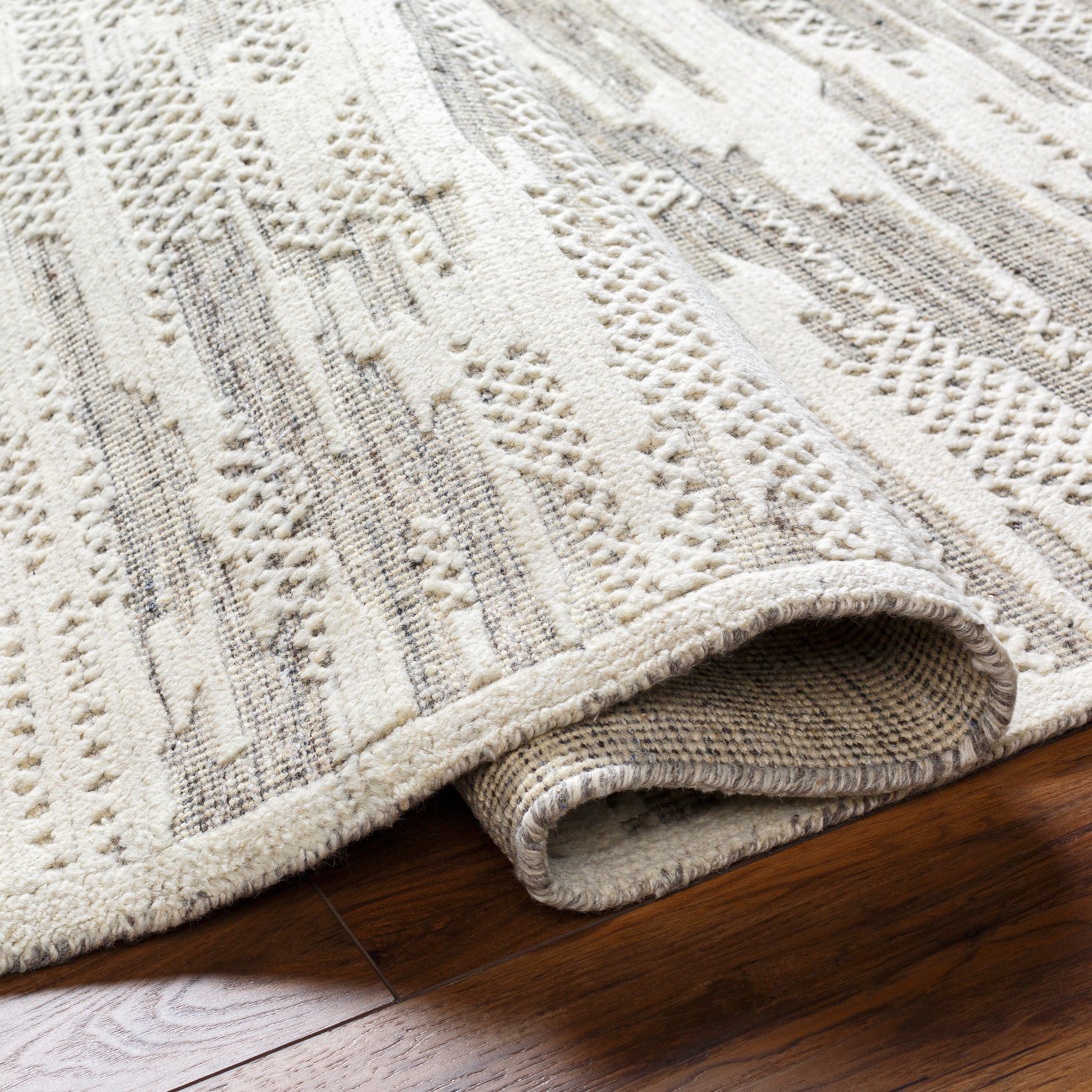 Featuring Tunus Jack Hand-Knotted Rug by Surya at Amethyst Home. The simplistic yet compelling rugs from the Tunus Collection effortlessly serve as the exemplar representation of modern decor. With their Hand-Knotted construction, these rugs provide a durability that can not be found in other handmade constructions, and boasts the ability to be thoroughly cleaned as it contai. Amethyst Home provides interior design, new construction, custom furniture, and area rugs in the Salt Lake City metro area