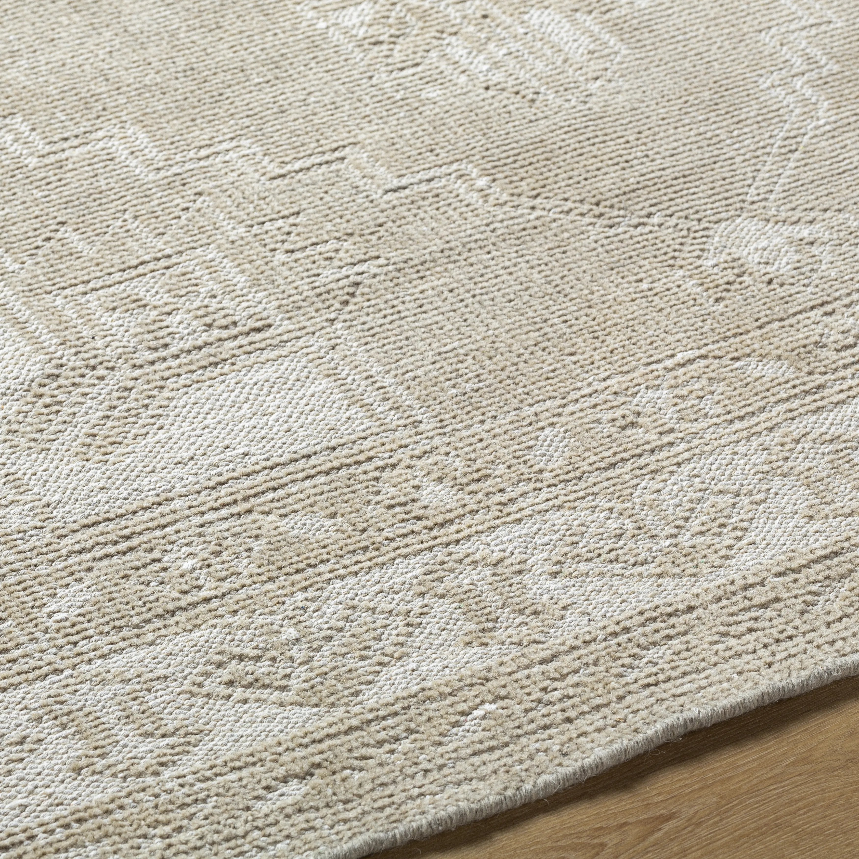 Featuring Zahra Natural Hand-Knotted Rug by Surya at Amethyst Home. The Zahra Collection showcases traditional inspired designs that exemplify timeless styles of elegance, comfort, and sophistication. With their hand knotted construction, these rugs provide a durability that can not be found in other handmade constructions, and boasts the ability to be thoroug. Amethyst Home provides interior design, new home construction design consulting, vintage area rugs, and lighting in the Boston metro area.