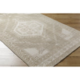 Featuring Zahra Natural Hand-Knotted Rug by Surya at Amethyst Home. The Zahra Collection showcases traditional inspired designs that exemplify timeless styles of elegance, comfort, and sophistication. With their hand knotted construction, these rugs provide a durability that can not be found in other handmade constructions, and boasts the ability to be thorough. Amethyst Home provides interior design, new home construction design consulting, vintage area rugs, and lighting in the Miami metro area.