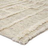 Featuring Tala Casamir Hand-Knotted Rug by Jaipur Living at Amethyst Home. The Tala Casamir Area Rug is a hand-knotted rug that brings a new sense of luxury and comfort to the contemporary home. The plush Casamir area rug makes a modern Moroccan statement, showcasing a crosshatched lattice design in an inviting cream hue with earthy toned flecks of br.  Amethyst Home provides interior design, new home construction design consulting, vintage area rugs, and lighting in the Salt Lake City metro area.