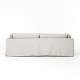 Featuring Habitat Sofa - Valley Nimbus by Four Hands at Amethyst Home. Loungey and slipcovered, the Habitat sofa is made for modern living. Shelter arms and pillow-inspired cushions are covered in comfortable, durable, and stain-resistant performance fabric. The thread within the fabric itself is doused in a material meant to prevent it from becoming sta.  Amethyst Home provides interior design, new home construction design consulting, vintage area rugs, and lighting in the Kansas City metro area.