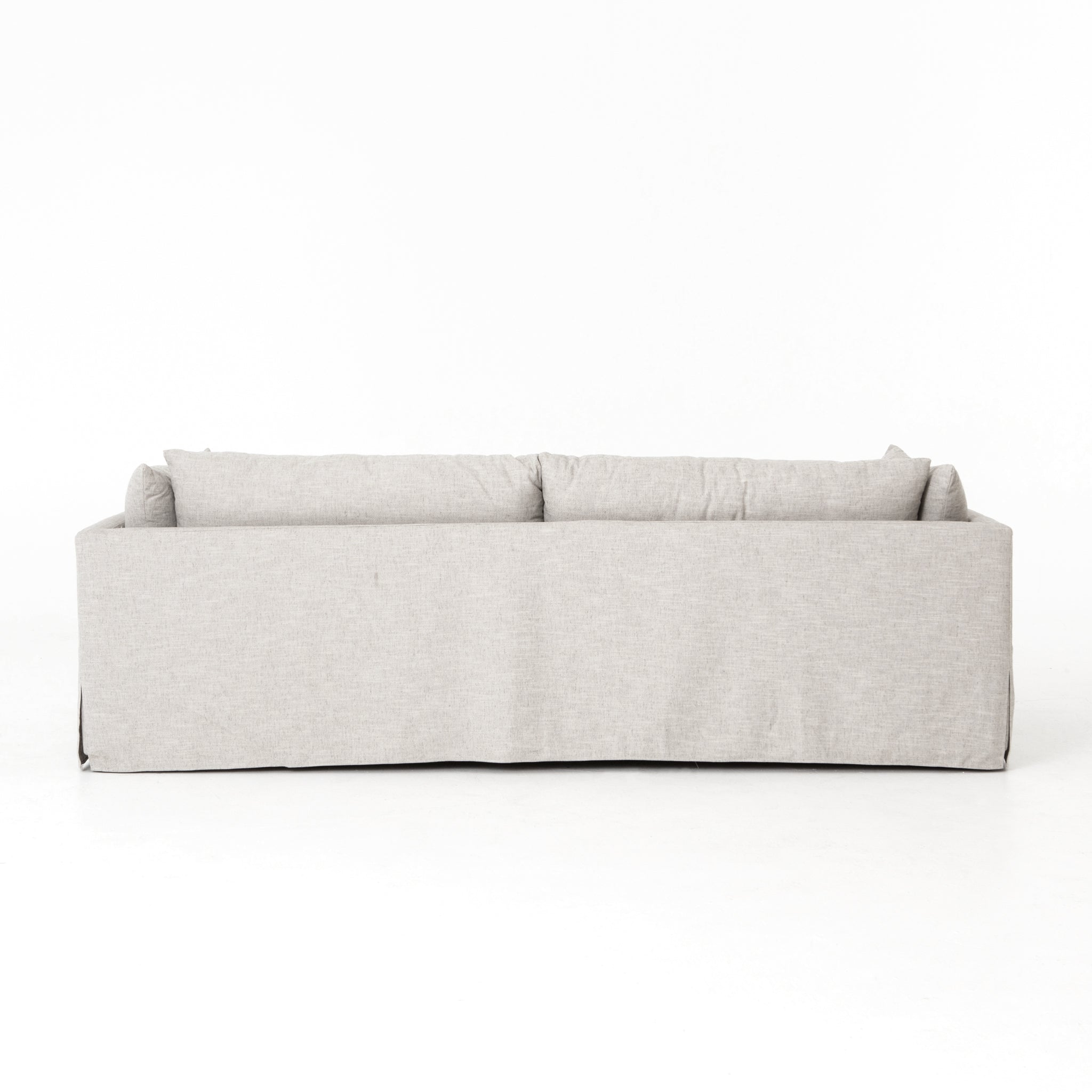 Featuring Habitat Sofa - Valley Nimbus by Four Hands at Amethyst Home. Loungey and slipcovered, the Habitat sofa is made for modern living. Shelter arms and pillow-inspired cushions are covered in comfortable, durable, and stain-resistant performance fabric. The thread within the fabric itself is doused in a material meant to prevent it from becoming sta.  Amethyst Home provides interior design, new home construction design consulting, vintage area rugs, and lighting in the Kansas City metro area.