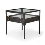 Featuring Shadow Box End Table by Four Hands at Amethyst Home. A shadowbox-inspired end table gives your inner collector a place to play. Frame prized possessions in a glass enclosure with matte-black metal and brass knobs. The perfect end table for a bed or sofa!
Overall Dimensions: 24"W x 24"L x 24"H
Colors: Black, Tempered GlassMaterials: Iron, Tempered.  Amethyst Home provides interior design, new home construction design consulting, vintage area rugs, and lighting in the Park City metro area.