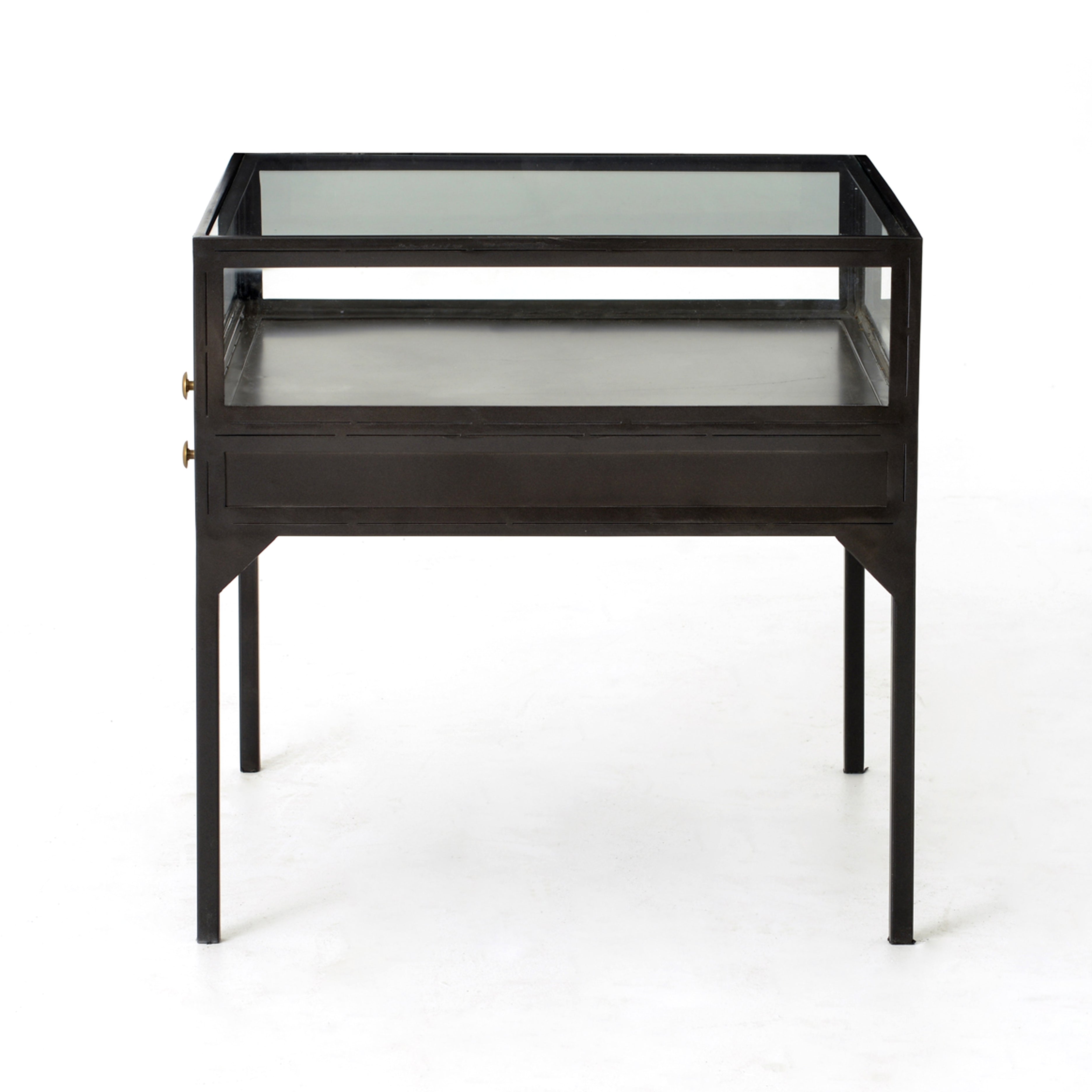 Featuring Shadow Box End Table by Four Hands at Amethyst Home. A shadowbox-inspired end table gives your inner collector a place to play. Frame prized possessions in a glass enclosure with matte-black metal and brass knobs. The perfect end table for a bed or sofa!
Overall Dimensions: 24"W x 24"L x 24"H
Colors: Black, Tempered GlassMaterials: Iron, Temp.  Amethyst Home provides interior design, new home construction design consulting, vintage area rugs, and lighting in the Newport Beach metro area.
