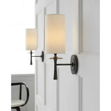 Featuring Drunmore Single Sconce by Visual Comfort at Amethyst Home. The Drunmore Single Sconce by AERIN combines traditional design with contemporary detailing. The modern design is finished in solid bronze or bronze with crystal detailing, and the elongated shade in either linen or white glass casts abundant illumination for hallways or bathrooms. Ide. Amethyst Home provides interior design, new home construction design consulting, vintage area rugs, and lighting in the Winter Garden metro area.