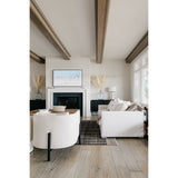 A piece we lovingly refer to as the "three legged-dog" to our clients, the Sullivan chair from Verellen is a beautiful statement piece from every angle. The 360 degree attention to detail makes it a striking piece in open concept spaces. This chair sits wonderfully for mounted televisions or with conversation and a glass of wine in the evening.  Select from Ash wood or Walnut legs.  33”w X 34”d x 28”/30”h