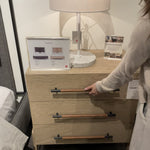 The light-finished oak of this Rosedale 3 Drawer Dresser brings a clean, brightness to any room. We love how the three spacious drawers have iron hardware wrapped in a gorgeous, tan leather. The dimension legs with iron connecting them bring a unique look to your bedroom or other area!  Overall Dimensions: 32.50"w x 19.50"d x 32.50"h