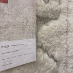 Inspired by Scandinavian textile motifs, the Hygge Collection combines a soft shaggy texture with an enduring neutral palette. Each piece is hand-loomed in India of 100% wool, ensuring long-wearing durability in even the busiest of rooms.     Hand Loomed 100% Wool India YG-03 Oatmeal/Ivory