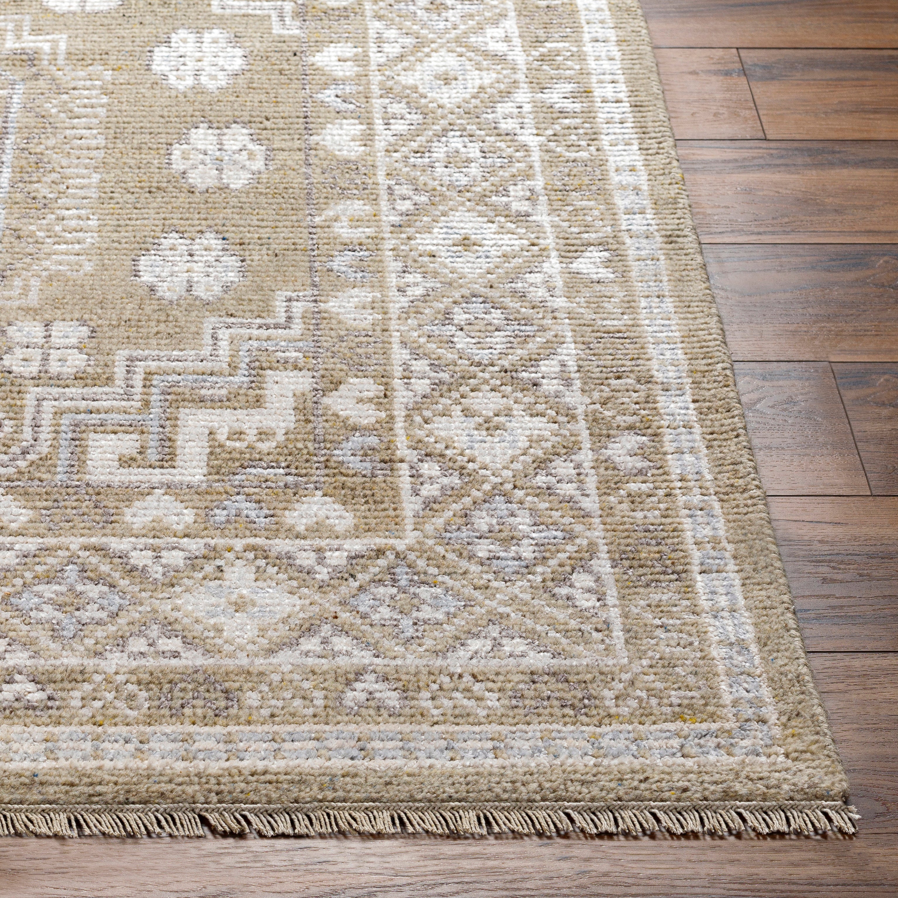 Featuring Almeria Taupe Hand-Knotted Rug by Surya at Amethyst Home. The Almeria Collection showcases traditional inspired designs that exemplify timeless styles of elegance, comfort, and sophistication. With their hand knotted construction, these rugs provide a durability that can not be found in other handmade constructions, and boasts the ability to be .  Amethyst Home provides interior design, new home construction design consulting, vintage area rugs, and lighting in the Washington metro area.