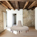 Featuring JD Coin 2 Piece Upholstered Sofa by Cisco Brothers at Amethyst Home. In a beautiful natural linen, this 360 degree coin sofa is an elegant statement in a foyer, striking in a master closet, or a perfect transition in living spaces. This coin sofa ships in two pieces for easy installation and comes with clips to secure the piece as one.  Or, for a ver.  Amethyst Home provides interior design, new home construction design consulting, vintage area rugs, and lighting in the Omaha metro area.