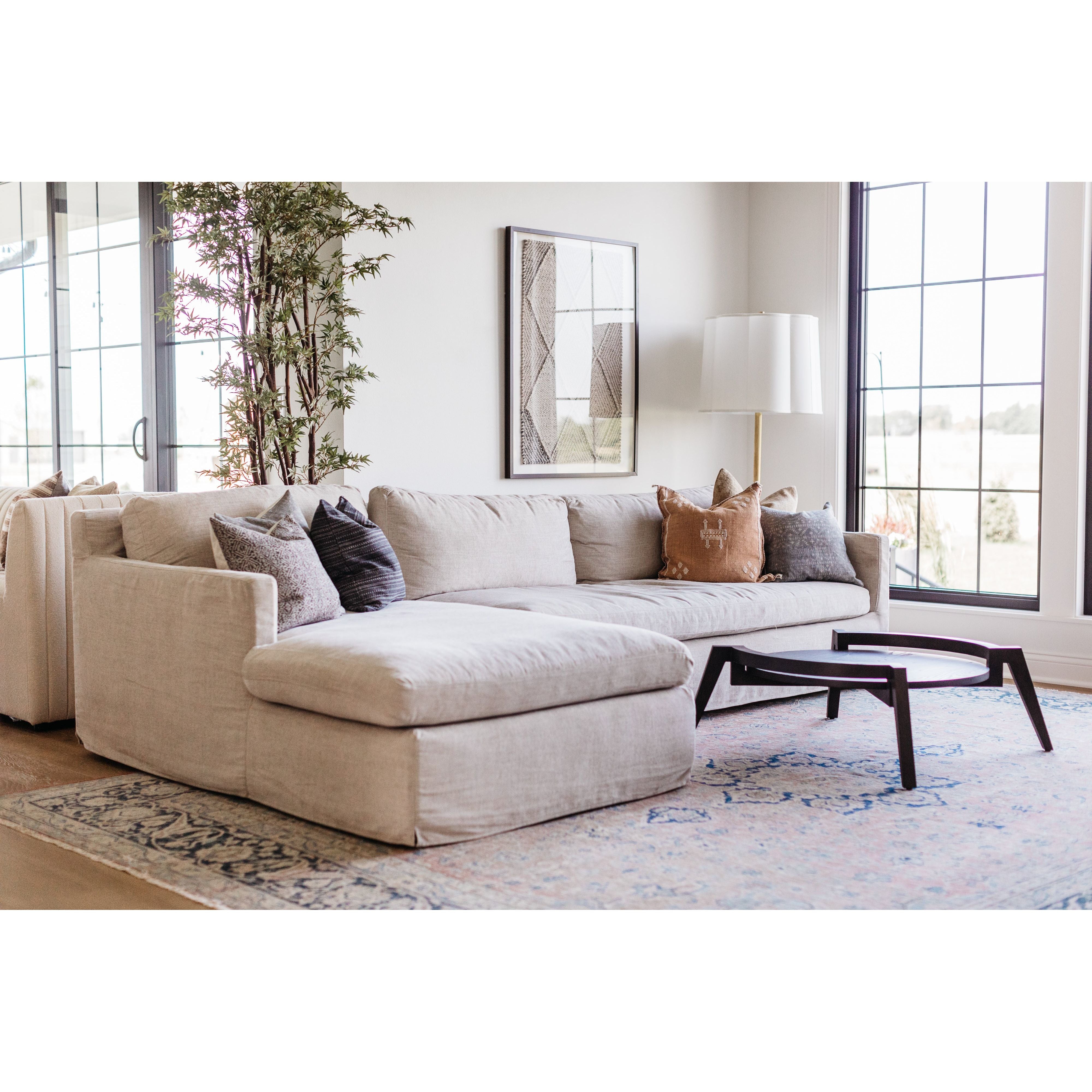 Featuring Louis 2 Piece Sectional - Custom by Cisco Brothers at Amethyst Home. A modern, tailored sofa made with the right stuff -- the Louis 2 Piece Sectional by Cisco Brothers is a classic, updated silhouette that is stunning and comfortable.
Overall: 121"w 68"d 31"hOverall Sitting Space: 81"w 54.5"dOne Arm Sofa: 80"w x 40"d x 31"h - Sitting Space: 65.5. Amethyst Home provides interior design, new home construction design consulting, vintage area rugs, and lighting in the San Diego metro area.