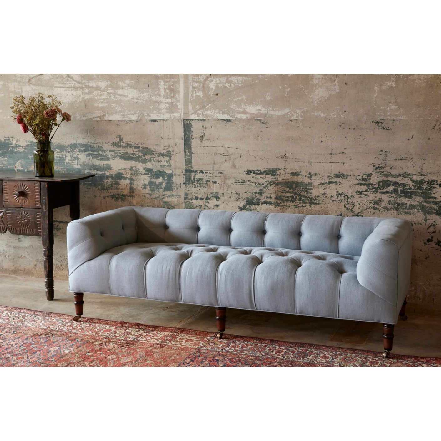 Featuring JD Field Bench with Back - Upholstered by Cisco Brothers at Amethyst Home. This JD Field Bench with Back - Upholstered is a glorious, tufted field bench on casters with leaps of old world meets modern style! A design collaboration between Cisco Home x John Derian. As shown in JD Vintage Steel 100% Linen.
Overall: 72"W x 22"H x 27"DSitting Space: 58". Amethyst Home provides interior design, new home construction design consulting, vintage area rugs, and lighting in the Omaha metro area.