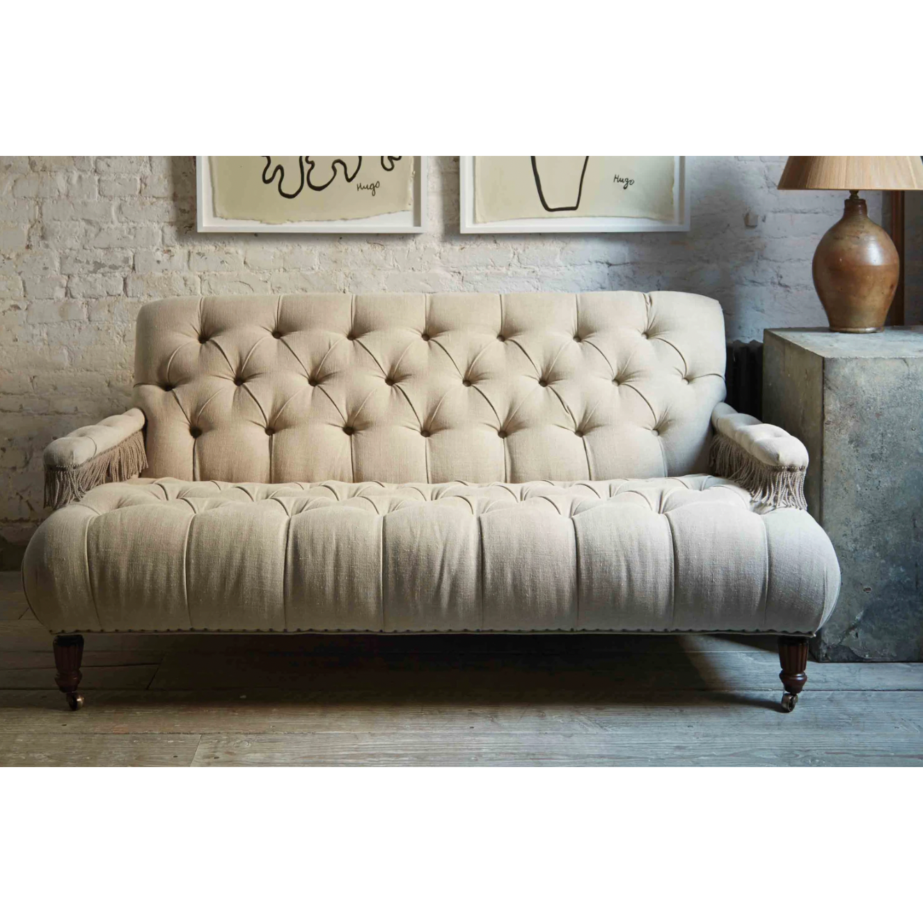 Featuring JD Coop 64" Sofa by Cisco Brothers at Amethyst Home. We love the fringe detail found on the arms of this Coop Sofa - John Derian by Cisco Home. A modern twist to a vintage look for any living room, bedroom, or other space!
Overall: 64"W x 31"H x 34"DSitting Space: 57"w x 22"dSeat Height: 17"hArm Height: 21"hWeight: 111lbsLeg: 7.75"h. Amethyst Home provides interior design, new home construction design consulting, vintage area rugs, and lighting in the Winter Garden metro area.