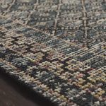 Hand-knotted in India of 100% wool, the Amara Ink/Turquoise Rug creates a casual yet refined vibe with high-end appeal. Showcase in your bedroom, living room, entryway, or other high-traffic area of your home.   Hand Knotted 100% Wool AMM-01 Ink/Turquoise