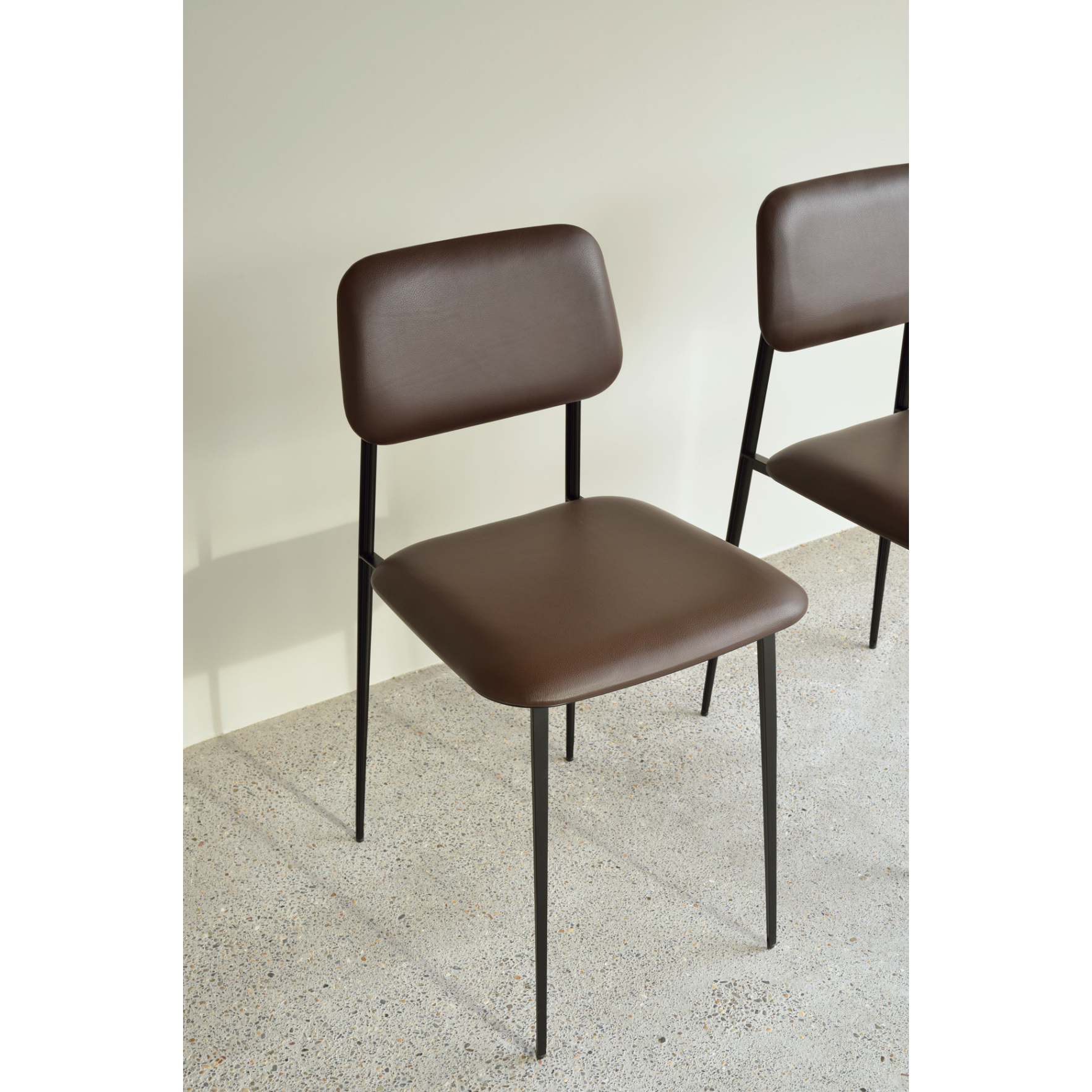 Featuring DC Dining Chair - Chocolate Leather by Ethnicraft at Amethyst Home. This DC Dining Chair is beautiful, minimalistic metal silhouette that would add an air of elegance to your dining table or kitchen. We love the details of the angled metal and the simplicity of this stunning chair.
Dimensions: 17"w x 19"d x 32.5"h Weight: 19 lbs
Seat Height: .  Amethyst Home provides interior design, new home construction design consulting, vintage area rugs, and lighting in the Newport Beach metro area.