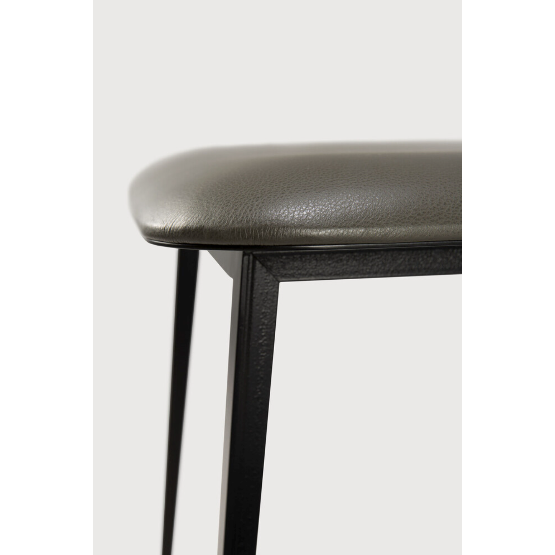 Featuring DC Dining Chair - Olive Green Leather by Ethnicraft at Amethyst Home. This DC Dining Chair is beautiful, minimalistic metal silhouette that would add an air of elegance to your dining table or kitchen. We love the details of the angled metal and the simplicity of this stunning chair.
Dimensions: 17"w x 19"d x 32.5"h Weight: 19 lbs
Seat Height: .  Amethyst Home provides interior design, new home construction design consulting, vintage area rugs, and lighting in the Kansas City metro area.