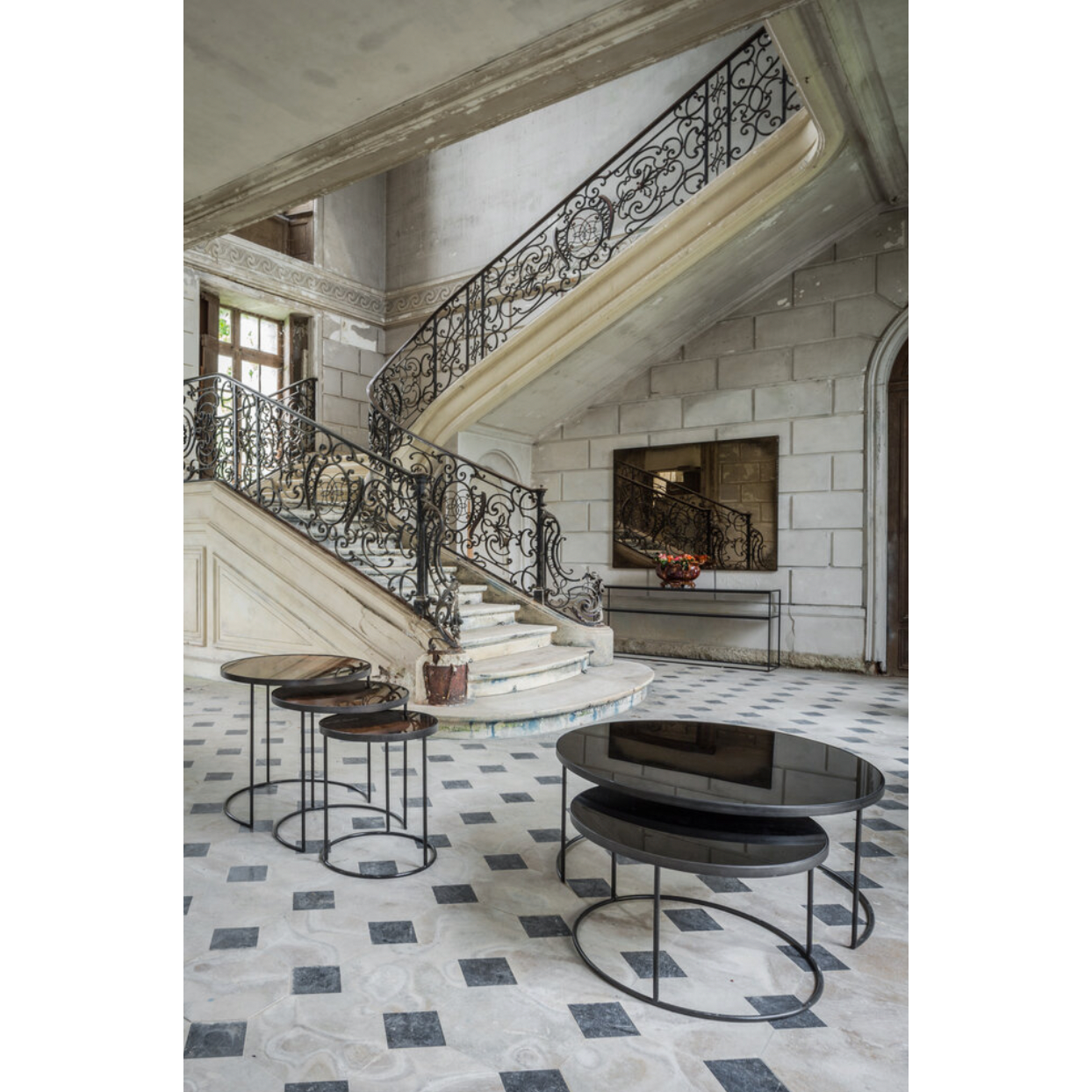 Featuring Nesting Coffee Table Set - Charcoal by Ethnicraft at Amethyst Home. Featuring a heavy aged mirror surface, this Nesting Coffee Table Set - Charcoal brings a vintage look with a modern twist to any living room or lounge area. 
Dimensions: Table 1 - 36.5"w x 36.5"d x 16.5"h Table 2 - 24"w x 24"d x 14"hWeight: 58 lbs
Material: Mirror
For regular dust.  Amethyst Home provides interior design, new home construction design consulting, vintage area rugs, and lighting in the Monterey metro area.