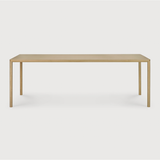 Featuring Oak Air Dining Table by Ethnicraft at Amethyst Home. With a simple, clean and minimal design, this Oak Air Dining Table is a table to add your dining room or kitchen area of years to come. The sleek bevelled legs makes the tabletop seems to float effortlessly above. 
Material: Oak, 100% Solid WoodFinish: Varnished
Dimensions 55": 55.5"w x 31.5"d x 3.  Amethyst Home provides interior design, new home construction design consulting, vintage area rugs, and lighting in the Austin metro area.