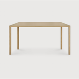 Featuring Oak Air Dining Table by Ethnicraft at Amethyst Home. With a simple, clean and minimal design, this Oak Air Dining Table is a table to add your dining room or kitchen area of years to come. The sleek bevelled legs makes the tabletop seems to float effortlessly above. 
Material: Oak, 100% Solid WoodFinish: Varnished
Dimensions 55": 55.5"w x 31..  Amethyst Home provides interior design, new home construction design consulting, vintage area rugs, and lighting in the Winter Garden metro area.