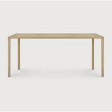 Featuring Oak Air Dining Table by Ethnicraft at Amethyst Home. With a simple, clean and minimal design, this Oak Air Dining Table is a table to add your dining room or kitchen area of years to come. The sleek bevelled legs makes the tabletop seems to float effortlessly above. 
Material: Oak, 100% Solid WoodFinish: Varnished
Dimensions 55": 55.5"w x 31.5"d x 30.  Amethyst Home provides interior design, new home construction design consulting, vintage area rugs, and lighting in the Omaha metro area.