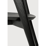 Featuring Oak Bok Dining Chair - Black by Ethnicraft at Amethyst Home. This Oak Bok Dining Chair features an airy shape with rock-solid construction,  making this piece a timeless and remarkable design to enjoy for years to come. Pair with a dining table or stand-alone against a wall, hallway, or end of the bed! Designed by Alain can Havre
Dimensions: 20.  Amethyst Home provides interior design, new home construction design consulting, vintage area rugs, and lighting in the Los Angeles metro area.