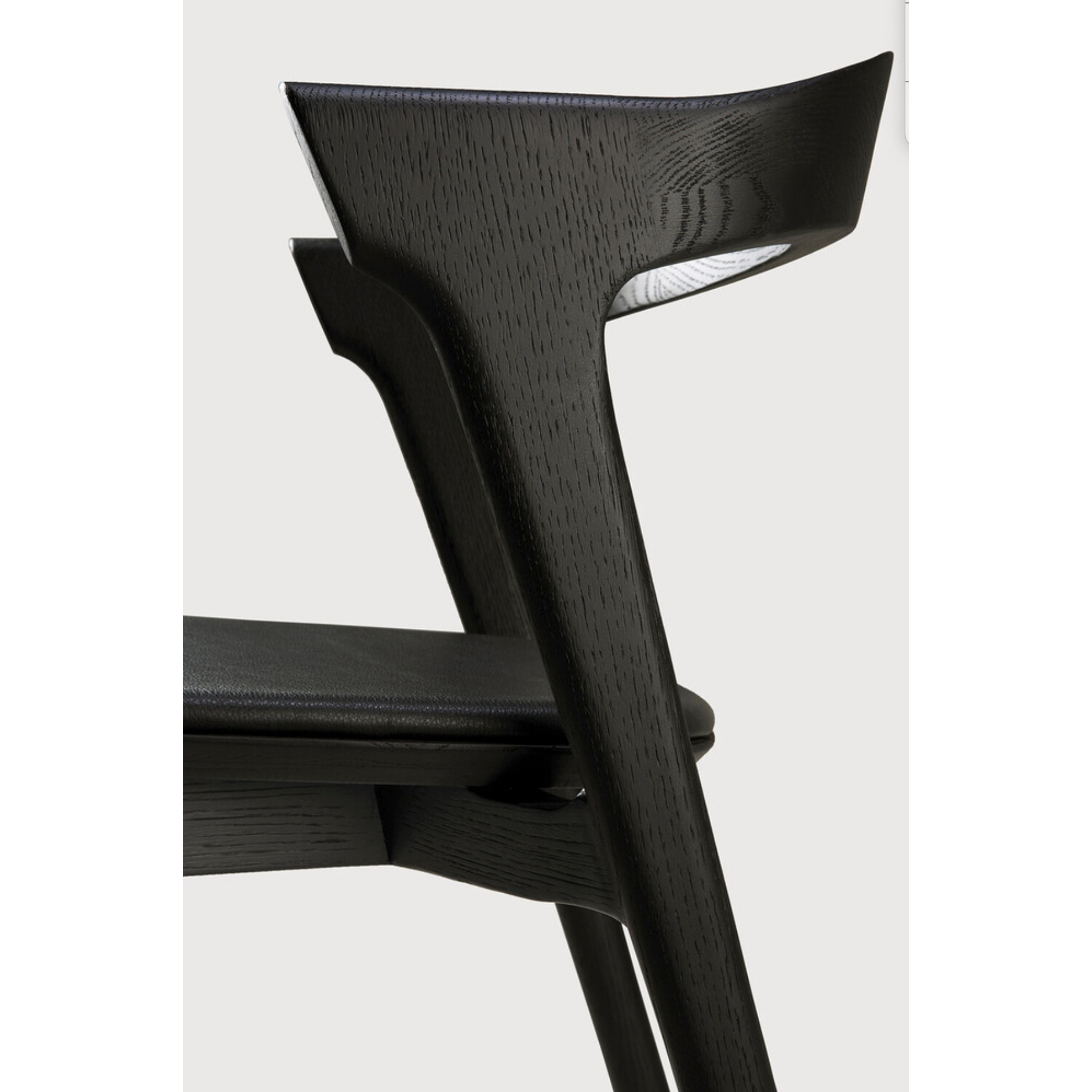 Featuring Oak Bok Dining Chair - Black - Black Leather by Ethnicraft at Amethyst Home. This Oak Bok Dining Chair features an airy shape with rock-solid construction,  making this piece a timeless and remarkable design to enjoy for years to come. Pair with a dining table or stand-alone against a wall, hallway, or end of the bed! Designed by Alain can Havre
Dim.  Amethyst Home provides interior design, new home construction design consulting, vintage area rugs, and lighting in the Austin metro area.