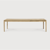 Featuring Oak Bok Extendable Dining Table by Ethnicraft at Amethyst Home. This Oak Bok Extendable Dining Table is perfect for families who want extra space when their kids, extended family, or guests come to celebrate! Its airy shape yet rock solid construction make this piece a timeless and remarkable design to enjoy for years to come.
Material: Oak, 100%.  Amethyst Home provides interior design, new home construction design consulting, vintage area rugs, and lighting in the San Diego metro area.